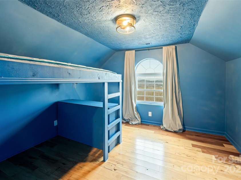 837 California Avenue, Marion, NC 28752.  MLS# CAR4260788, YatesRealty ID 1847. Bedroom with Bunk and Desk