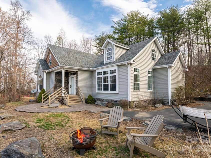 837 California Avenue, Marion, NC 28752.  MLS# CAR4260788, YatesRealty ID 1847. Front of home is perfect to sit at the firepit with smores and bask in the stunning mountain views whether winter or.....