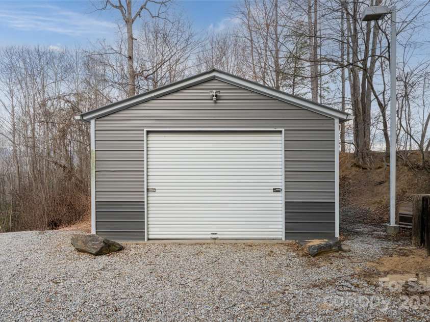 837 California Avenue, Marion, NC 28752.  MLS# CAR4260788, YatesRealty ID 1847. One car garage/workshop.