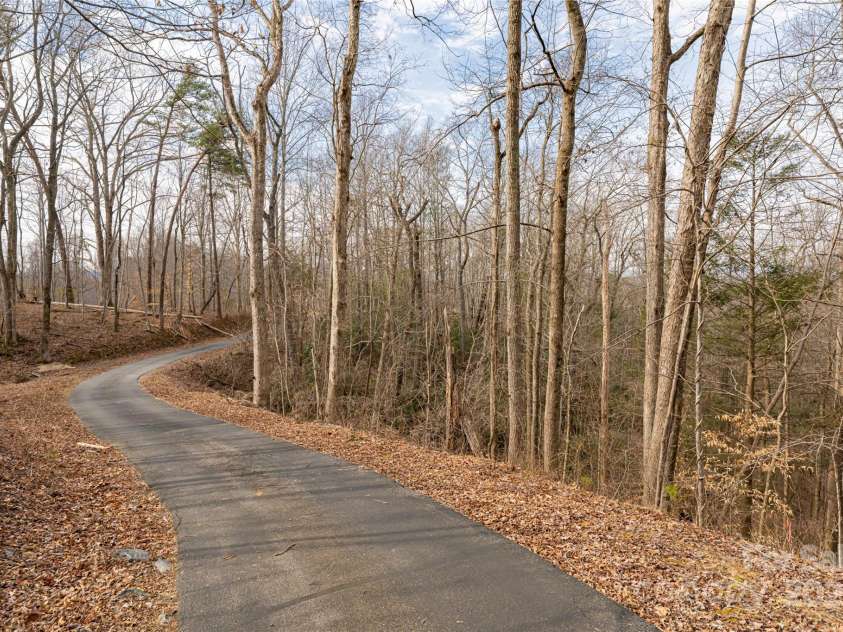 837 California Avenue, Marion, NC 28752.  MLS# CAR4260788, YatesRealty ID 1847. The tree lined paved driveway leads you to your private oasis away from the daily hustle and bustle!