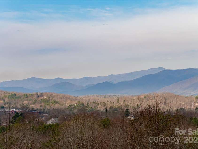 837 California Avenue, Marion, NC 28752.  MLS# CAR4260788, YatesRealty ID 1847. What a relaxing view to enjoy every single day throughout the different seasons.