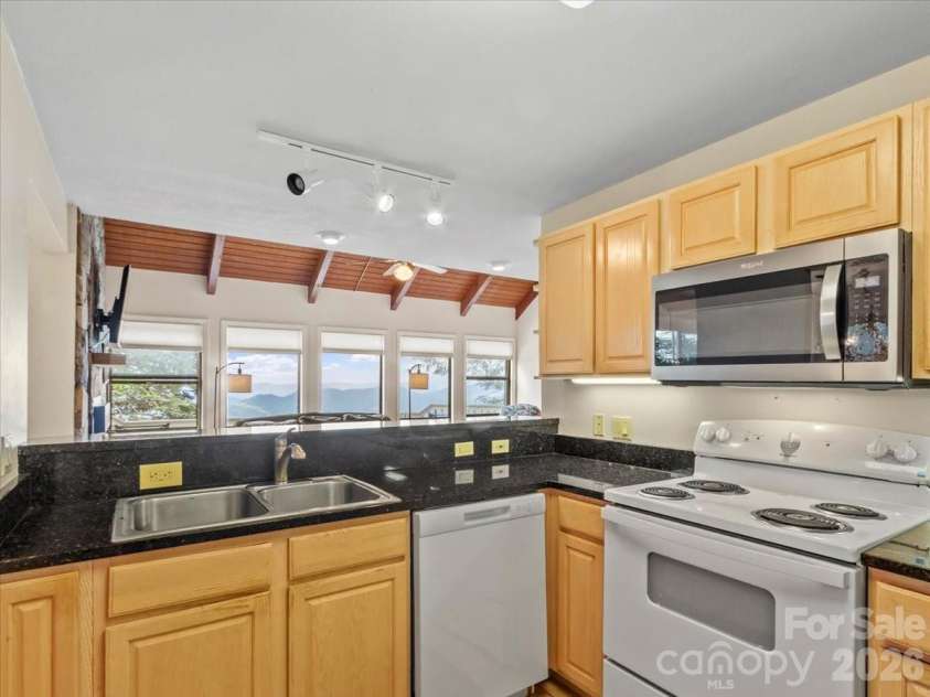 19 Lookout Loop, Burnsville, NC 28714.  MLS# CAR4361238, YatesRealty ID 18471. KITCHEN WITH A VIEW!