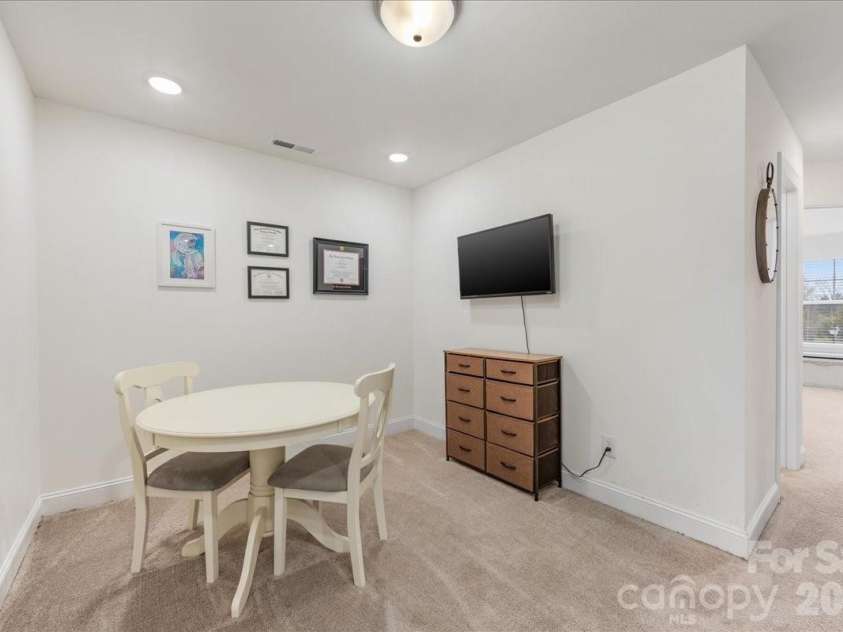 5923 Hampstead Pond Lane, Matthews, NC 28105.  MLS# CAR4340634, YatesRealty ID 18474. Loft/flex space.