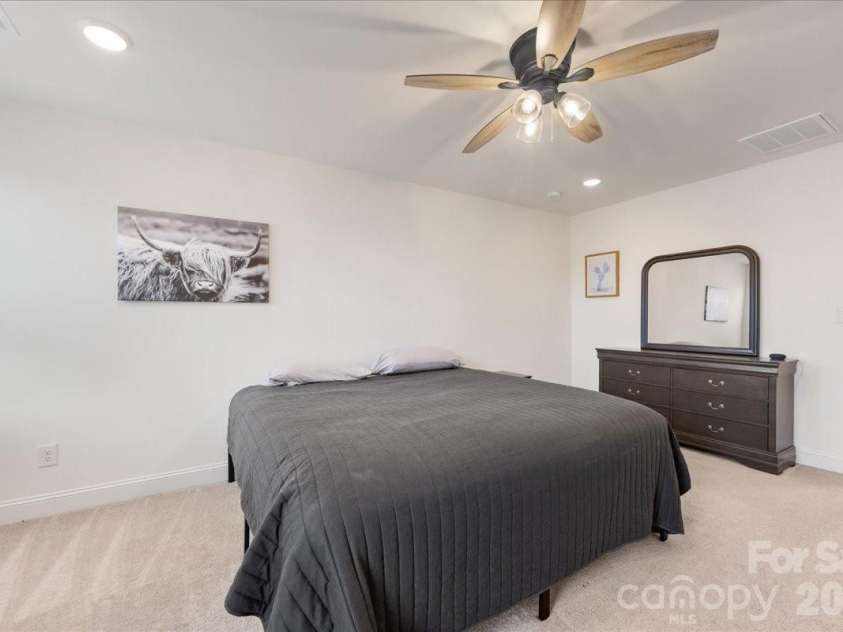 5923 Hampstead Pond Lane, Matthews, NC 28105.  MLS# CAR4340634, YatesRealty ID 18474. Primary suite includes a spacious walk-in closet.