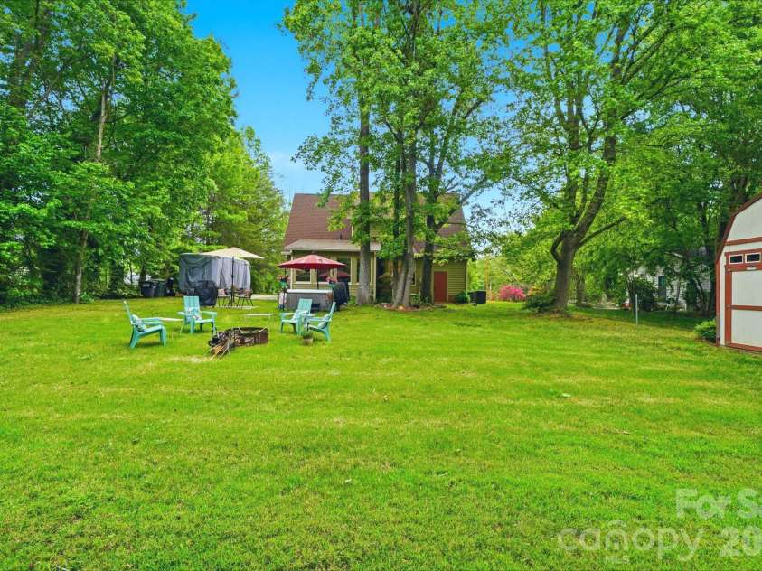 1224 Candlewood Drive, Gastonia, NC 28052.  MLS# CAR4373409, YatesRealty ID 18475. Backyard with Firepit and Large Work Shed