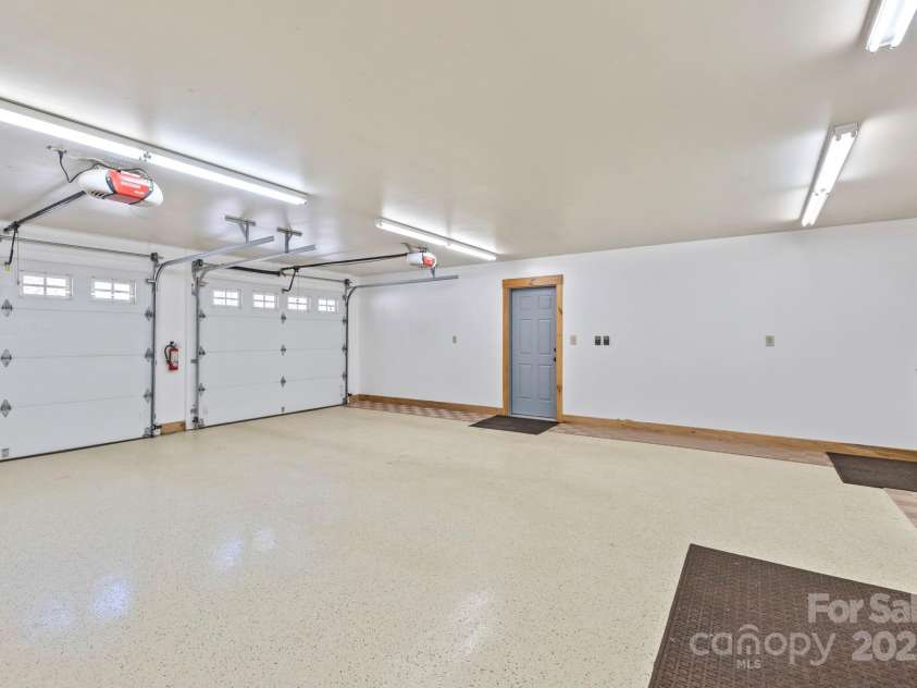 216 Log Gap Road, Fairview, NC 28730.  MLS# CAR4221522, YatesRealty ID 18479. Attached Oversized Two Car Garage