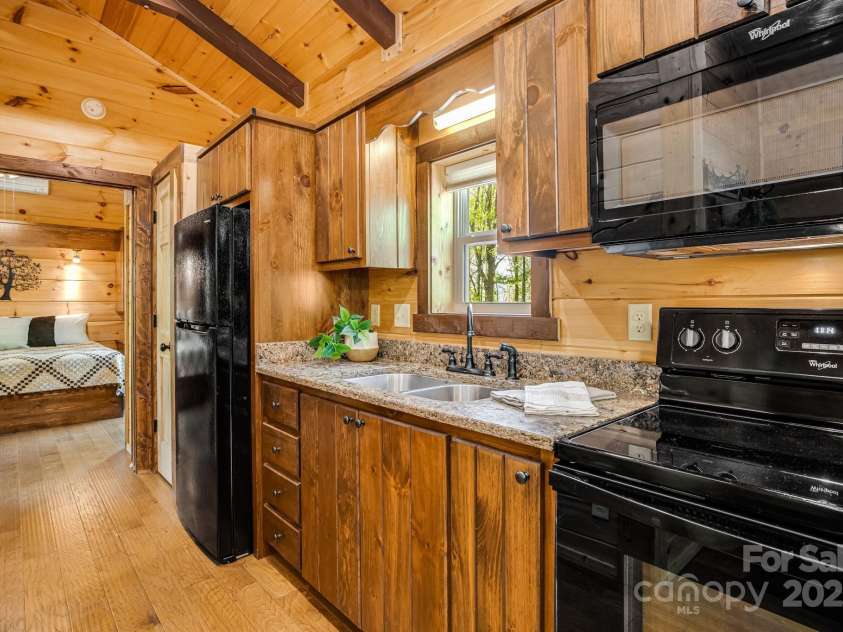216 Log Gap Road, Fairview, NC 28730.  MLS# CAR4221522, YatesRealty ID 18479. Counter Space and Pantry
