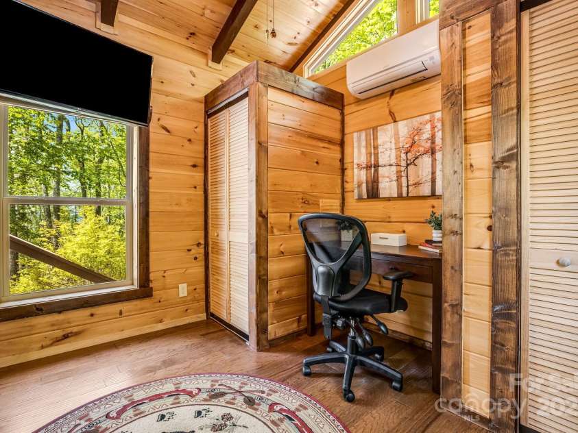 216 Log Gap Road, Fairview, NC 28730.  MLS# CAR4221522, YatesRealty ID 18479. Secondary Bedroom - Currently Used as an Office, Stackable Laundry is in One Closet