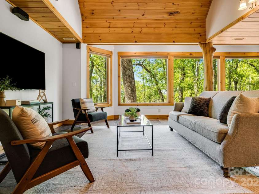 216 Log Gap Road, Fairview, NC 28730.  MLS# CAR4221522, YatesRealty ID 18479. Triple pane glass windows, privacy, winter mountain views