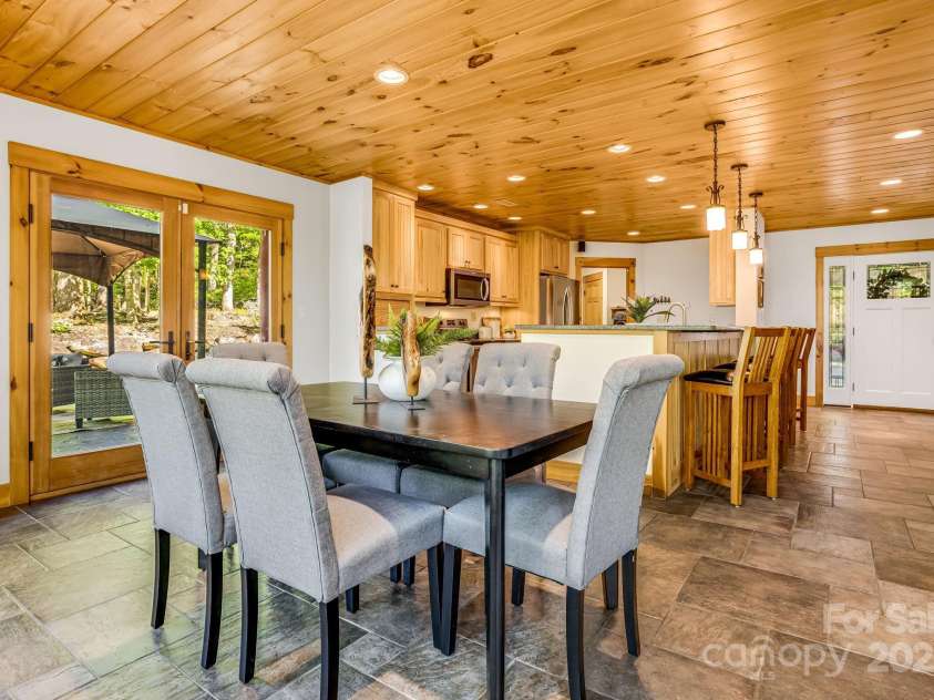 214 & 216 Log Gap Road, Fairview, NC 28730.  MLS# CAR4234130, YatesRealty ID 18480. Entertain Here! French Doors Lead to Patio + Sauna