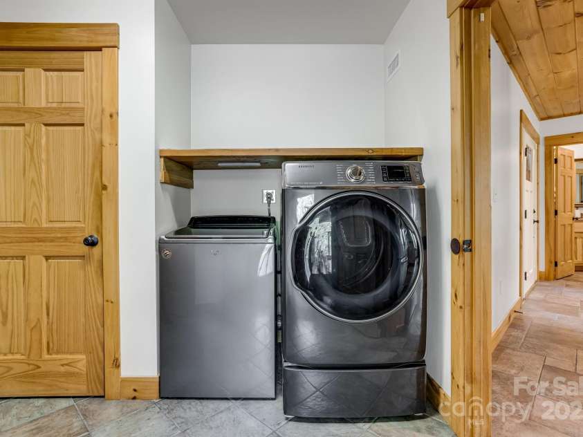 214 & 216 Log Gap Road, Fairview, NC 28730.  MLS# CAR4234130, YatesRealty ID 18480. Main Floor Laundry