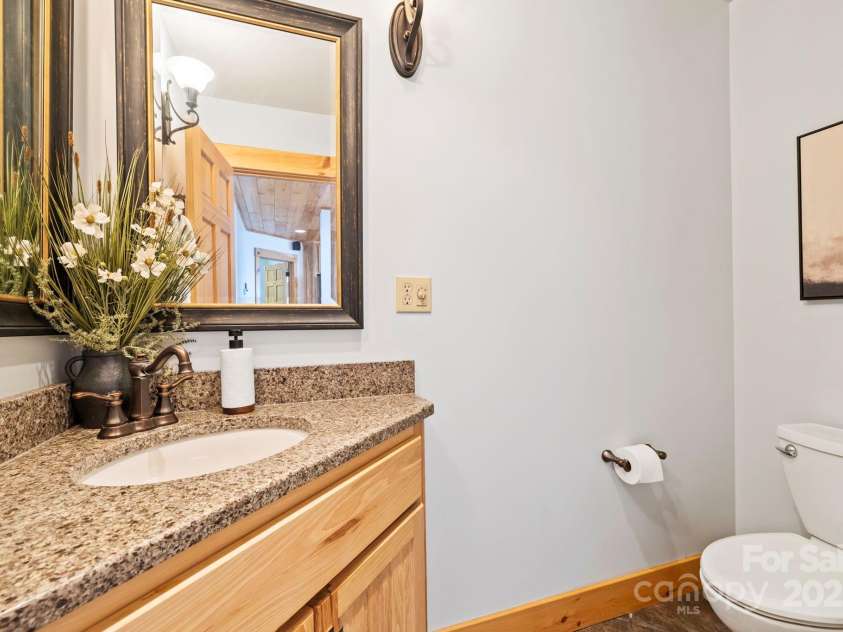 214 & 216 Log Gap Road, Fairview, NC 28730.  MLS# CAR4234130, YatesRealty ID 18480. Powder Room - Main Level