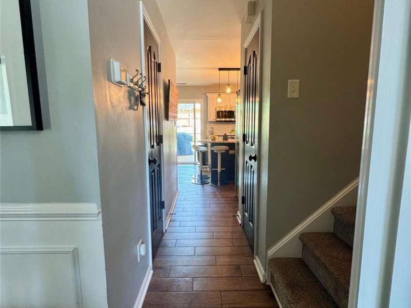 15003 Jerpoint Abby Drive, Charlotte, NC 28273.  MLS# CAR4247292, YatesRealty ID 18483. Hall to Half Bath