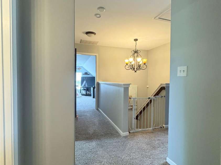 15003 Jerpoint Abby Drive, Charlotte, NC 28273.  MLS# CAR4247292, YatesRealty ID 18483. Hall Upstairs