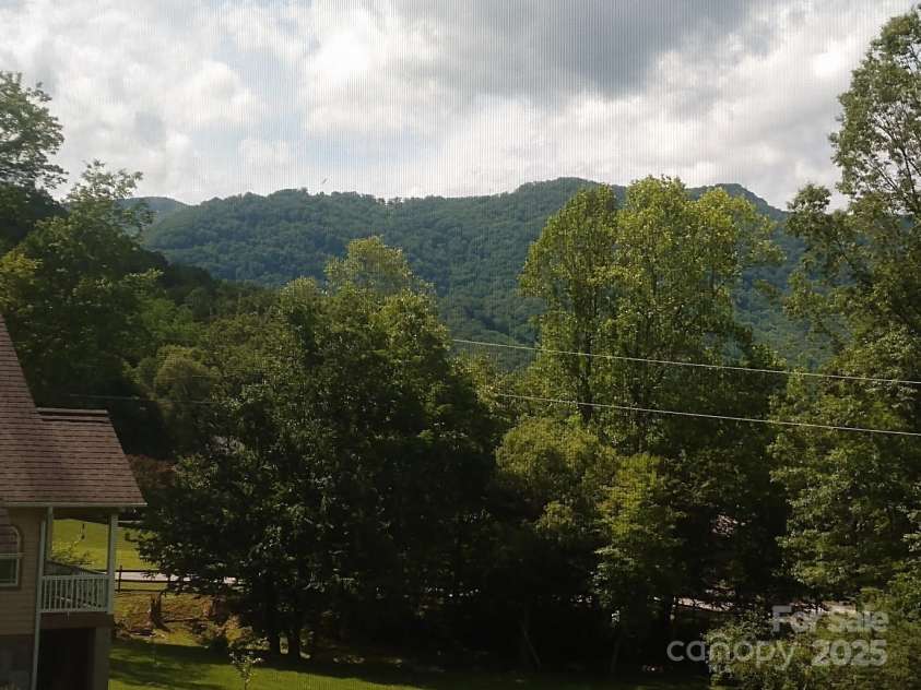 41 Balsam Shadows Road, Maggie Valley, NC 28751.  MLS# CAR4266877, YatesRealty ID 18489. 