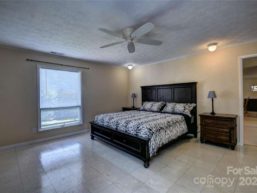 41 Balsam Shadows Road, Maggie Valley, NC 28751.  MLS# CAR4266877, YatesRealty ID 18489. Large, Primary bedroom on the main level