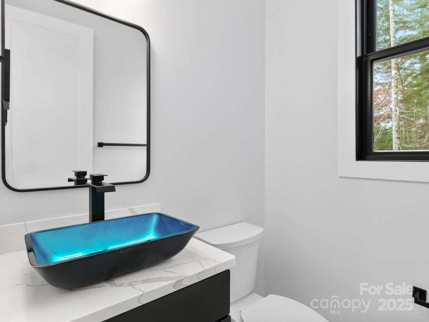 43 Reta Road, Fairview, NC 28730.  MLS# CAR4198071, YatesRealty ID 1850. Half bath