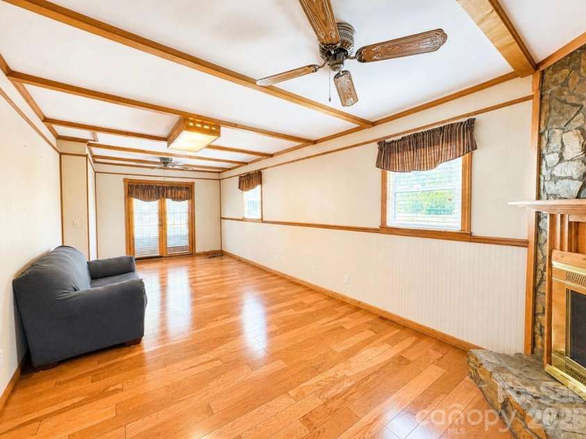 3253 US 70 Highway, Marion, NC 28752.  MLS# CAR4335999, YatesRealty ID 18502. Den w/Gas Logs