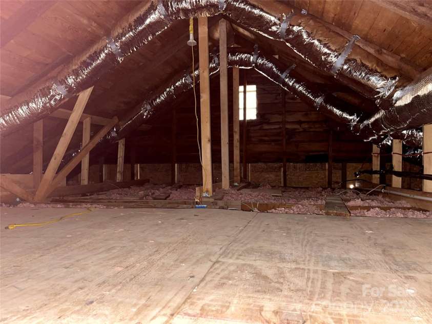 576 Grays Creek Church Road, Rutherfordton, NC 28139.  MLS# CAR4240567, YatesRealty ID 18504. Pull-down attic stairs & decking in attic for lots of storage