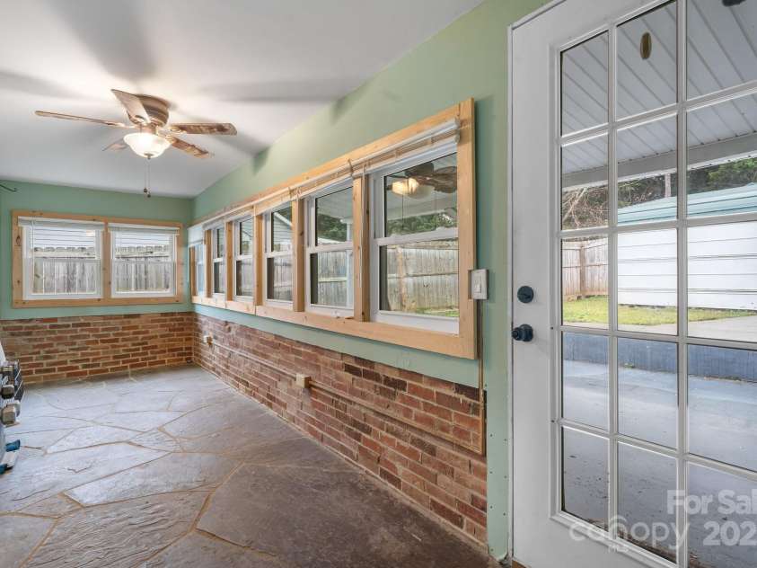 591 Oak Street, Marion, NC 28752.  MLS# CAR4253110, YatesRealty ID 18506. Enclosed Back Room with Heat.