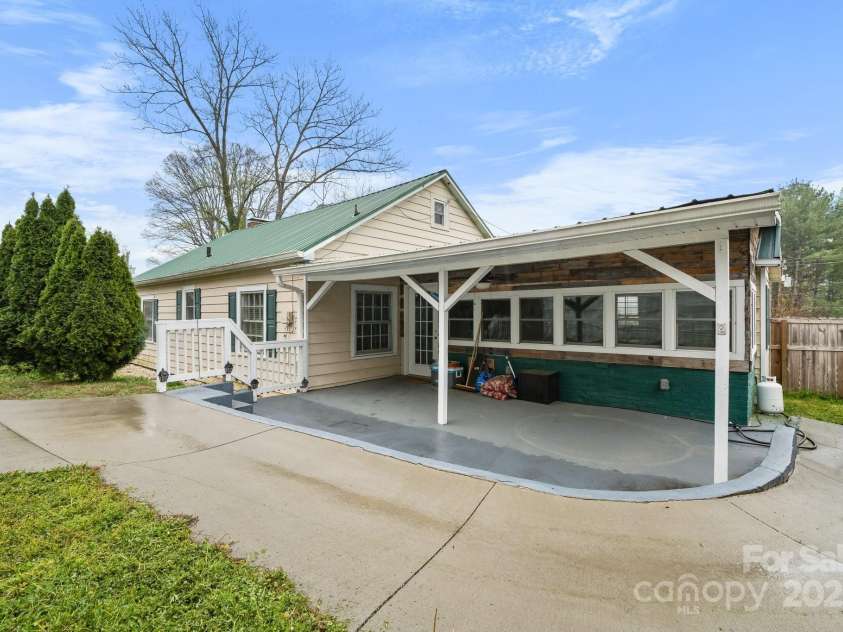 591 Oak Street, Marion, NC 28752.  MLS# CAR4253110, YatesRealty ID 18506. Rear of Home with Covered Patio.