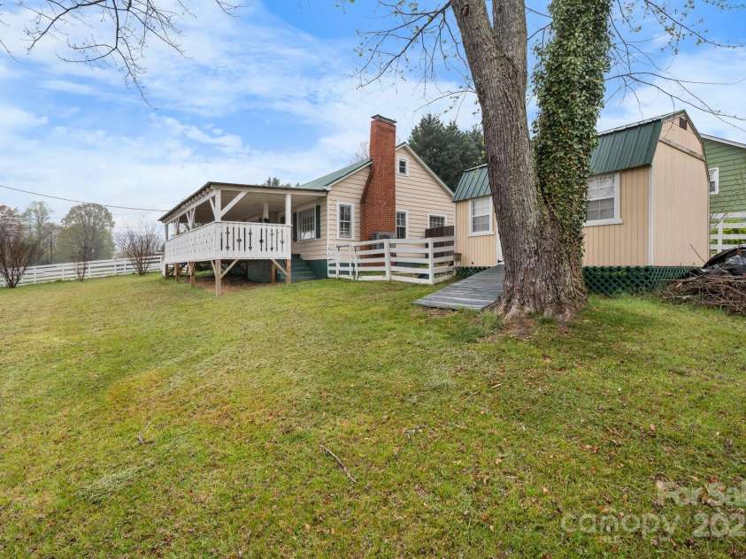 591 Oak Street, Marion, NC 28752.  MLS# CAR4253110, YatesRealty ID 18506. Side View with Spacious Storage Shed.