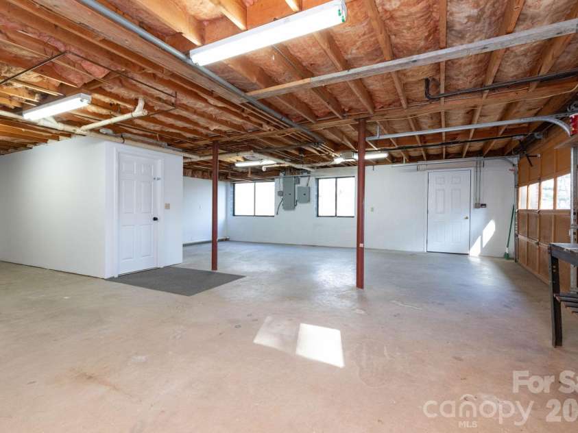 84 Joe jenkins Road, Fairview, NC 28730.  MLS# CAR4320581, YatesRealty ID 18509. Workshop and Garage