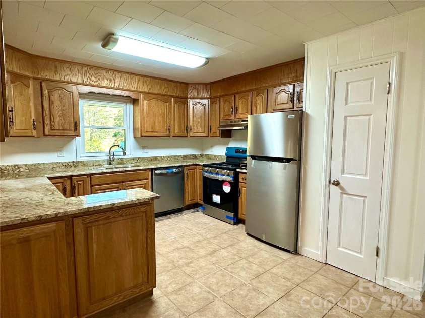 208 Murdock Road, Bakersville, NC 28705.  MLS# CAR4315892, YatesRealty ID 18510. Large Pantry - New Appliances