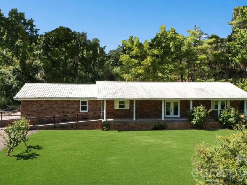 208 Murdock Road, Bakersville, NC 28705.  MLS# CAR4315892, YatesRealty ID 18510. The Landscaping has been slightly enhanced by Ai
