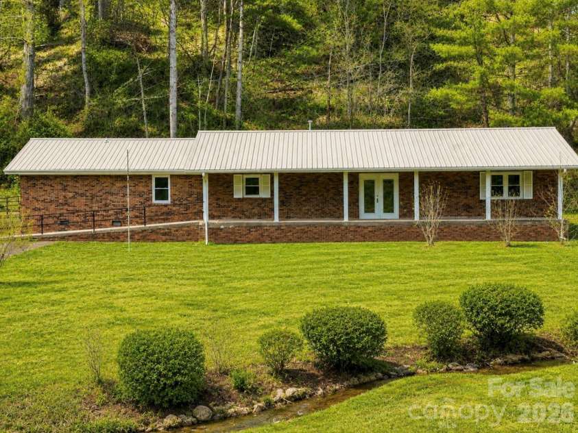 208 Murdock Road, Bakersville, NC 28705.  MLS# CAR4315892, YatesRealty ID 18510. Virtual Landscaping at Creek.