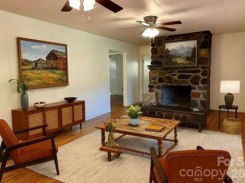 208 Murdock Road, Bakersville, NC 28705.  MLS# CAR4315892, YatesRealty ID 18510. Virtual Staged Living Room