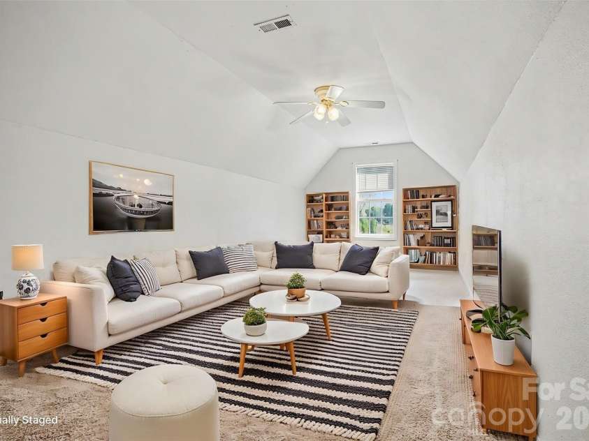 125 Sawhorse Drive, Mooresville, NC 28115.  MLS# CAR4369659, YatesRealty ID 18514. Loft Area Virtually Staged