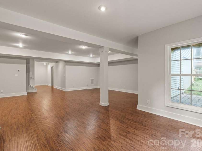 10211 Rivendell Lane, Charlotte, NC 28269.  MLS# CAR4376096, YatesRealty ID 18518. Basement
