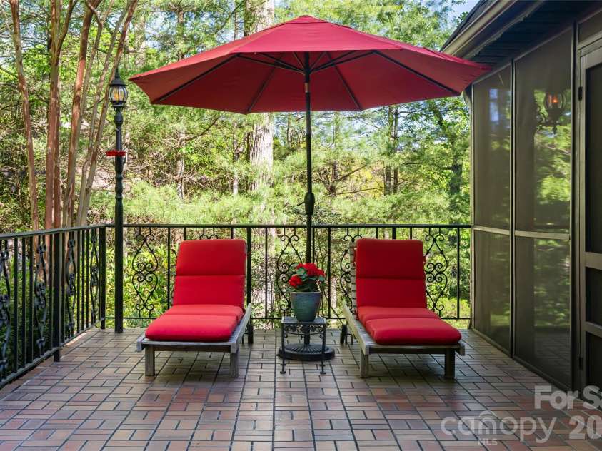 7 Cooper Cove, Hendersonville, NC 28739.  MLS# CAR4371497, YatesRealty ID 18519. Front porch