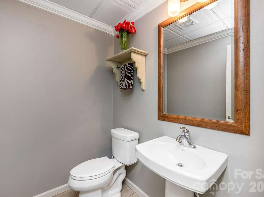 7 Cooper Cove, Hendersonville, NC 28739.  MLS# CAR4371497, YatesRealty ID 18519. Lower half bath