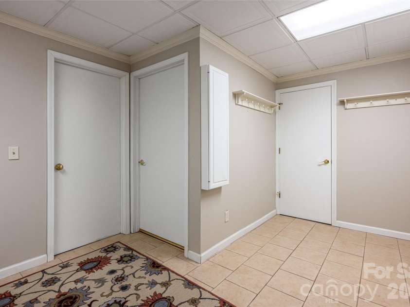 7 Cooper Cove, Hendersonville, NC 28739.  MLS# CAR4371497, YatesRealty ID 18519. Lower level