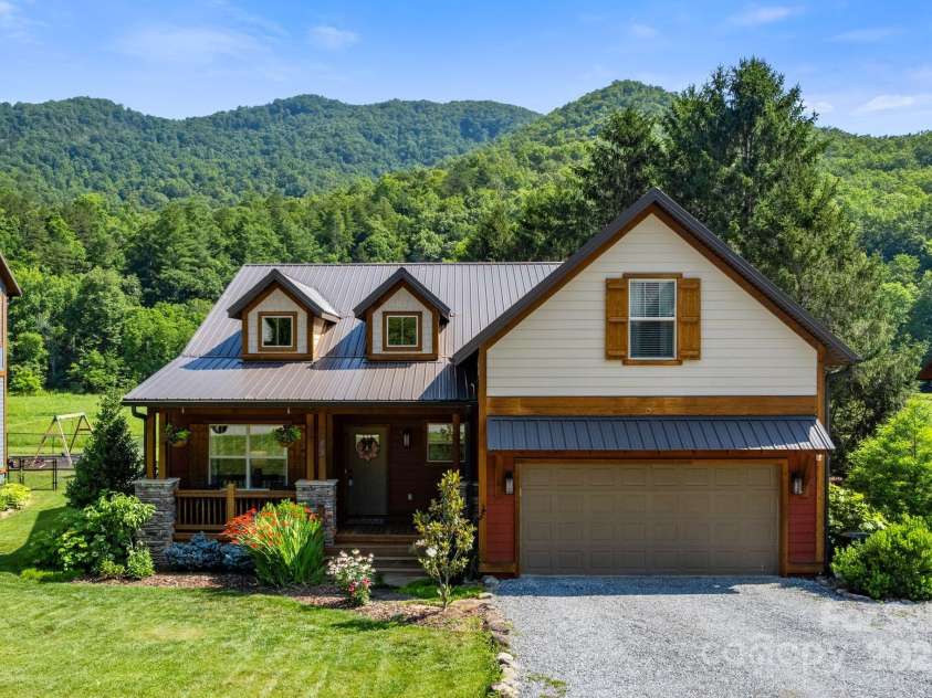 49 Sundrops Trail, Cullowhee, NC 28723.  MLS# CAR4266552, YatesRealty ID 18521. 