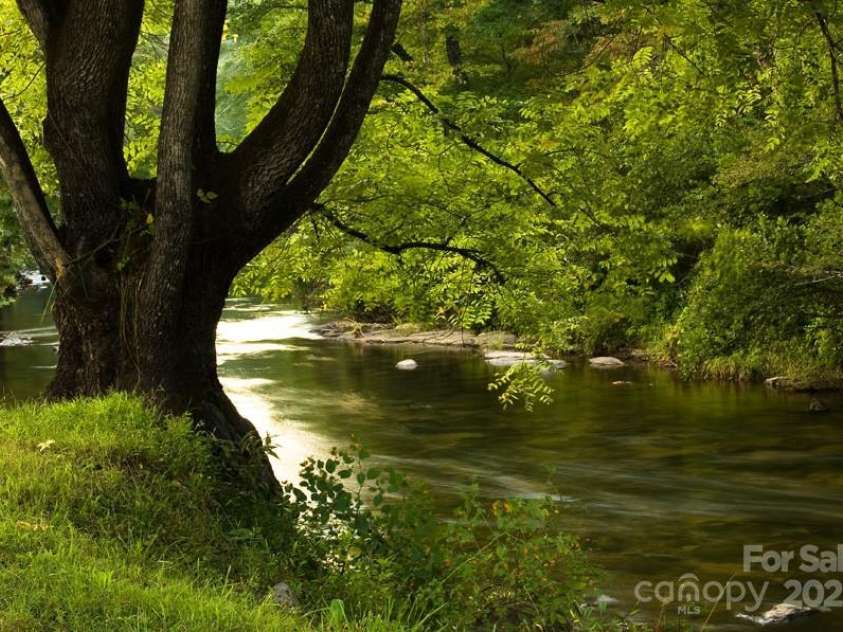 49 Sundrops Trail, Cullowhee, NC 28723.  MLS# CAR4266552, YatesRealty ID 18521. Caney Fork Creek