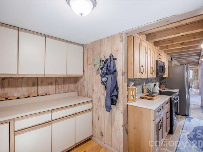 70 Aberdeen Lane, Pisgah Forest, NC 28768.  MLS# CAR4372037, YatesRealty ID 18522. Mud room area with storage
