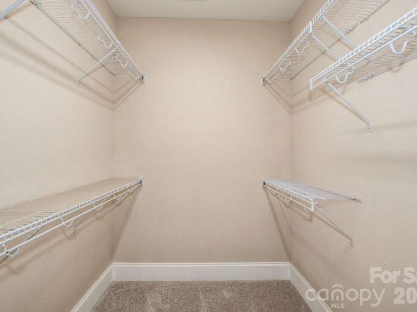 124 Cedar Woods Drive, Mooresville, NC 28117.  MLS# CAR4357080, YatesRealty ID 18527. His & Hers walk-in closets