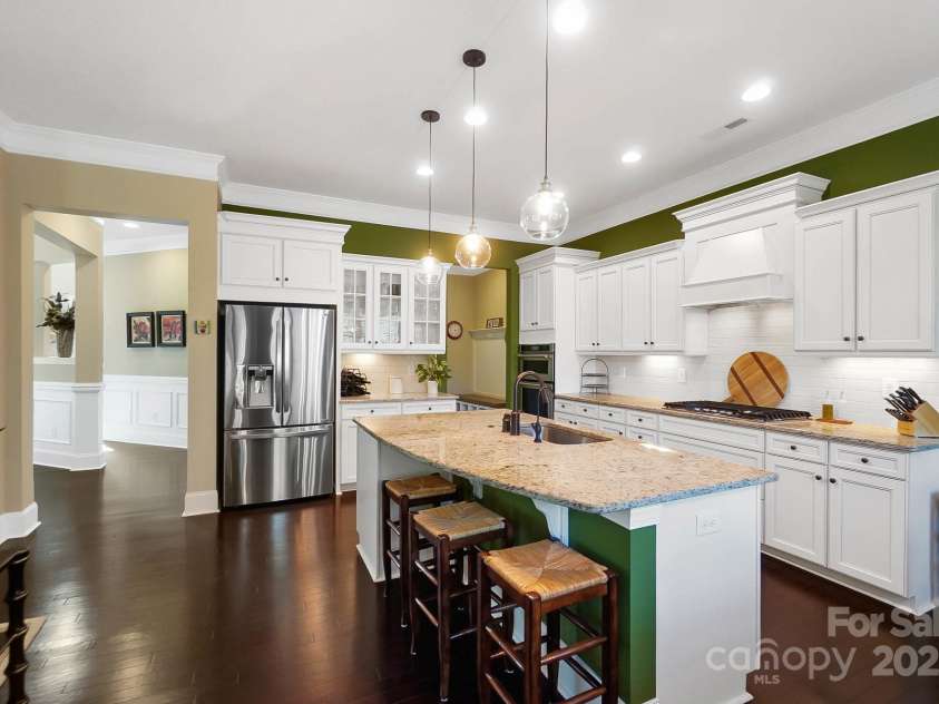 9735 Wheatfield Road, Charlotte, NC 28277.  MLS# CAR4253750, YatesRealty ID 18527. Open concept kitchen with oversized island and S/S Appliances