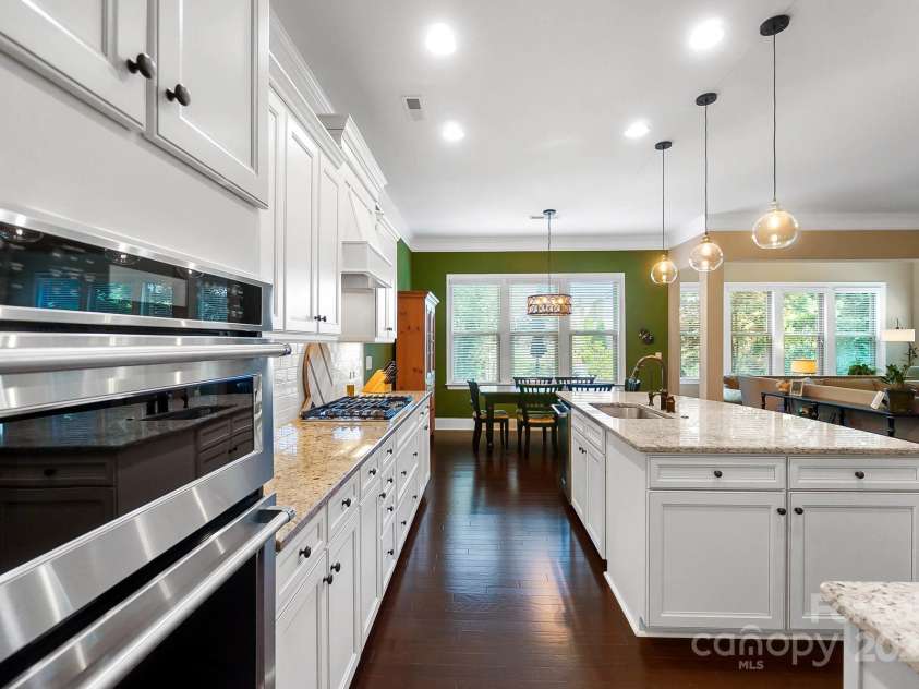 9735 Wheatfield Road, Charlotte, NC 28277.  MLS# CAR4253750, YatesRealty ID 18527. Open concept kitchen with oversized island and S/S Appliances