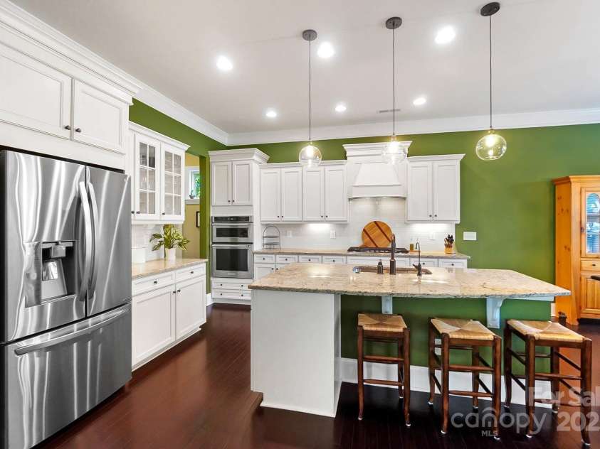 9735 Wheatfield Road, Charlotte, NC 28277.  MLS# CAR4253750, YatesRealty ID 18527. Open concept kitchen with oversized island and S/S Appliances