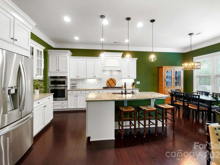 9735 Wheatfield Road, Charlotte, NC 28277.  MLS# CAR4253750, YatesRealty ID 18527. Open concept kitchen with oversized island and S/S Appliances