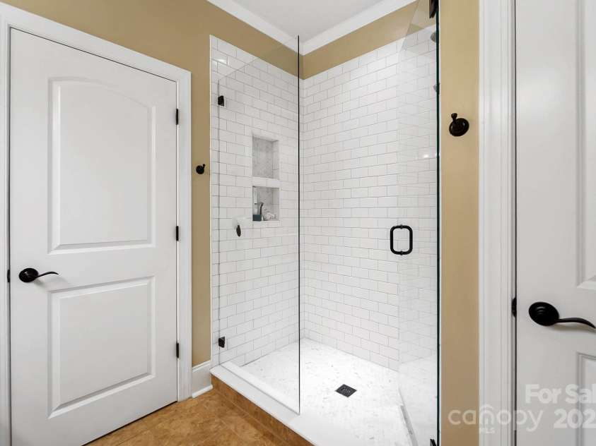 9735 Wheatfield Road, Charlotte, NC 28277.  MLS# CAR4253750, YatesRealty ID 18527. Primary suite full tile stand up shower