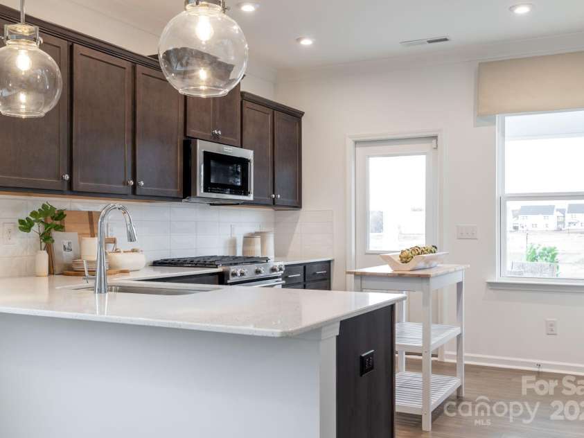 14015 Penbury Lane, Charlotte, NC 28278.  MLS# CAR4252901, YatesRealty ID 18528. Representative Photo Only