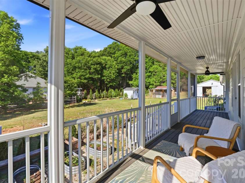 7332 Bailywick Drive, Waxhaw, NC 28173.  MLS# CAR4365077, YatesRealty ID 18528. Covered screened back porch