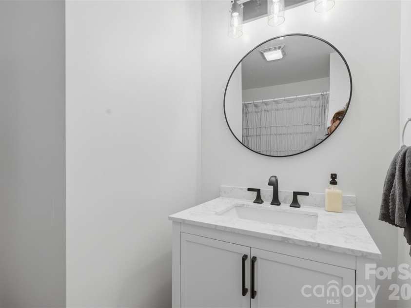 7332 Bailywick Drive, Waxhaw, NC 28173.  MLS# CAR4365077, YatesRealty ID 18528. Downstairs 2nd full bath vanity