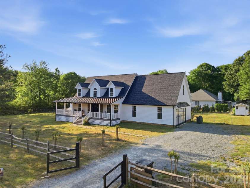 7332 Bailywick Drive, Waxhaw, NC 28173.  MLS# CAR4365077, YatesRealty ID 18528. Gated entry, oversized 2-car sideload garage, shed, barns, and more!