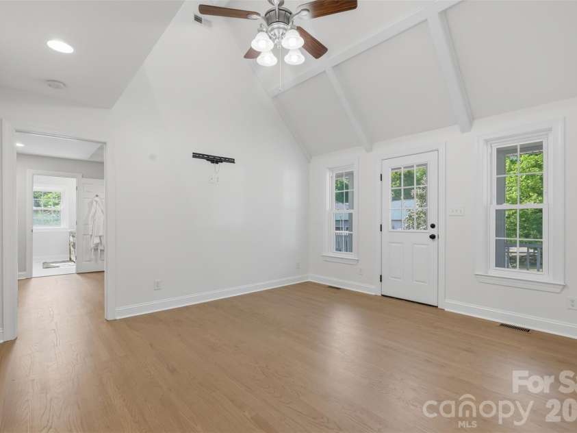 7332 Bailywick Drive, Waxhaw, NC 28173.  MLS# CAR4365077, YatesRealty ID 18528. Living room with vaulted ceiling & newly refinished floors